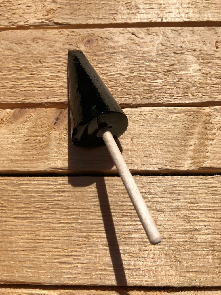 Klubba med smak av lakrits.